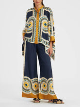 Pantalones anchos y sueltos con estampado floral retro único